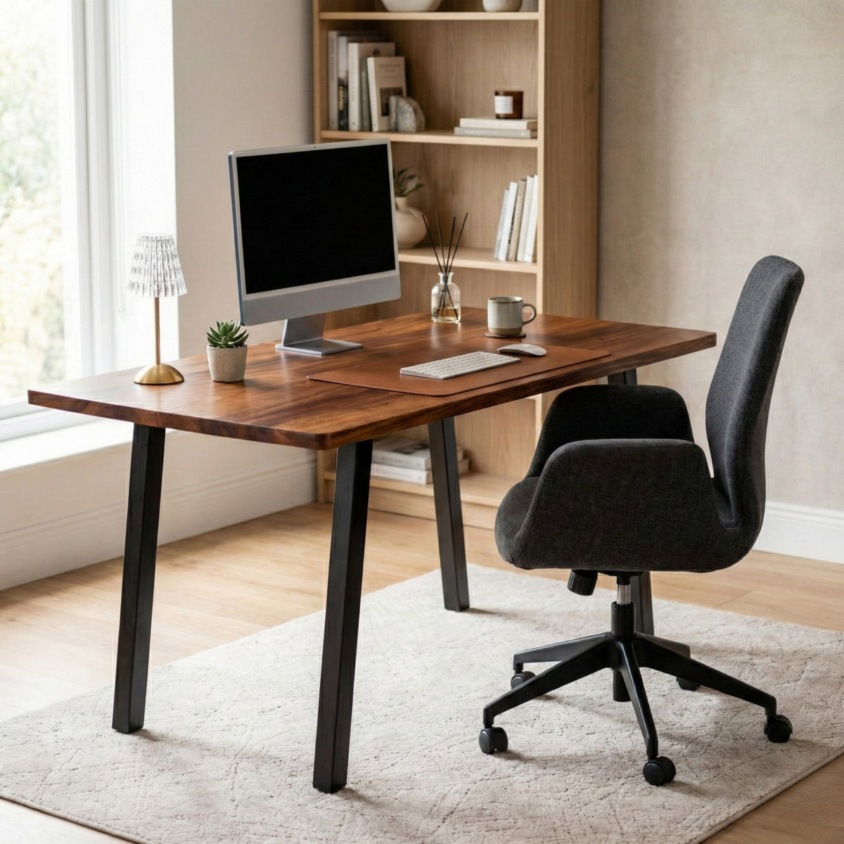 Extra Deep Solid Walnut Computer Desk with computer setup in a home office setting
