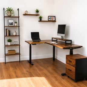 Walnut L-shaped standing desk with office furniture in a room.