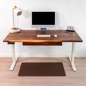 walnut adjustable standing desk with drawers, featuring a live edge walnut design, white adjustable frame, ergonomic office setup.