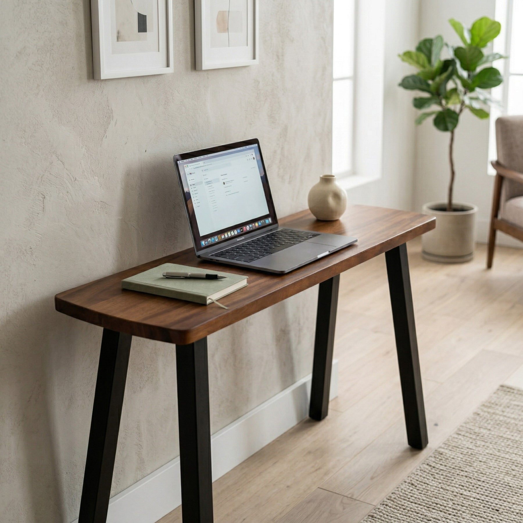 Small laptop table in the living room with decor