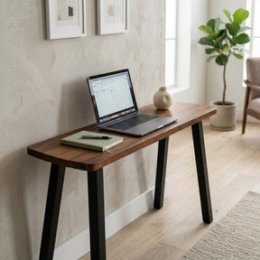 Small laptop table in the living room with decor