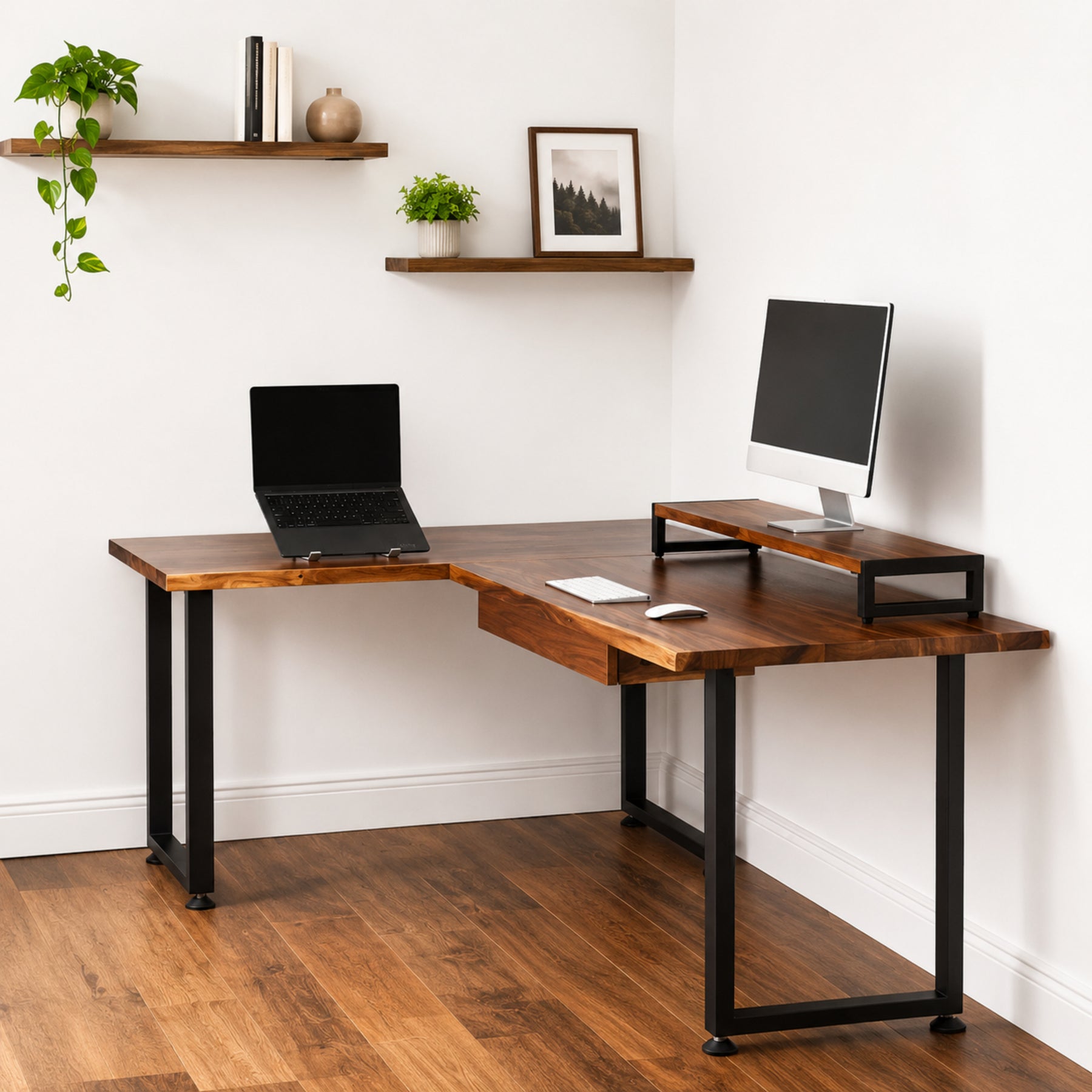 Walnut solid wood L-shaped desk with drawer, laptop, and monitor setup in a home office.