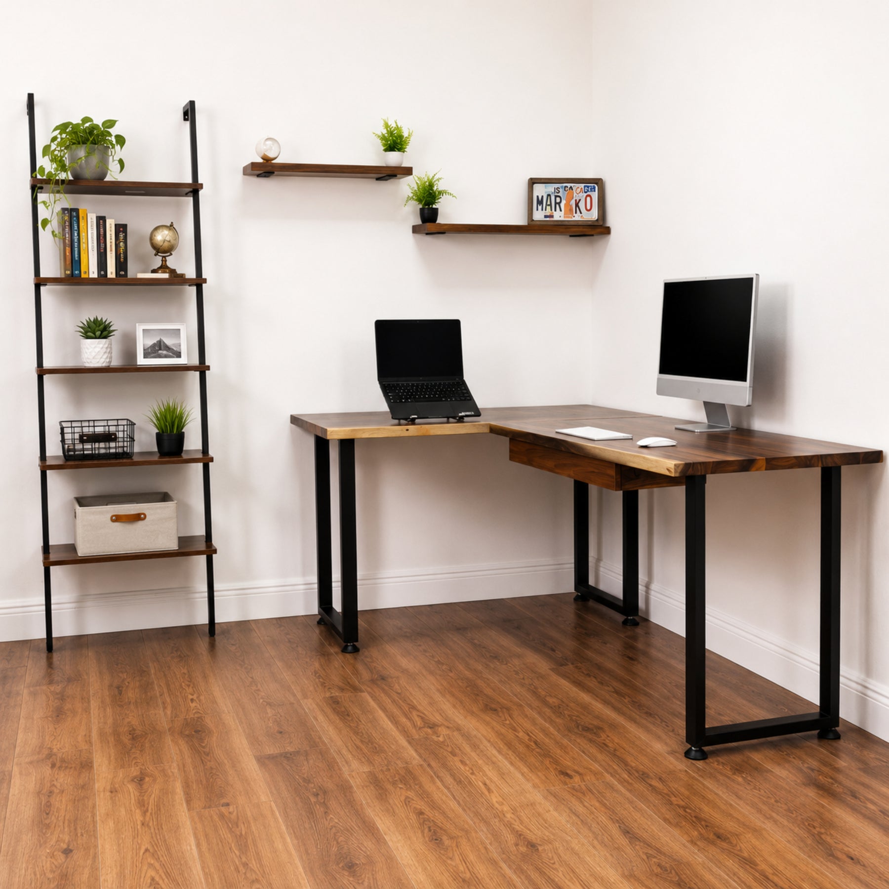 Walnut solid wood L-shaped desk with drawer, laptop, and monitor in a home office setting.