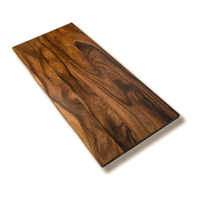 High-quality walnut desk table top with rich wood grain pattern, perfect for standing desks and workspaces. 